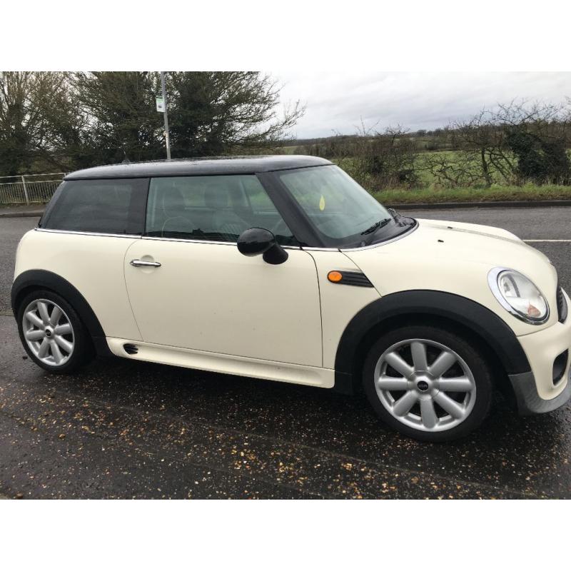 White Mini Cooper with JOHN COOPER WORKS