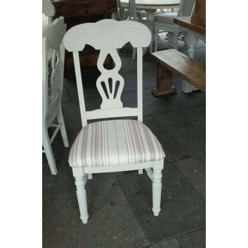 set of painted chairs