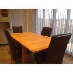 Solid Oak Dining Table and Four Chairs