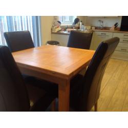 Solid Oak Dining Table and Four Chairs