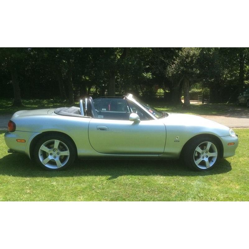 Mazda MX5 Nevada, 1840cc, Cerion Silver, Blue leather (heated) seats, Blue mohair hood.