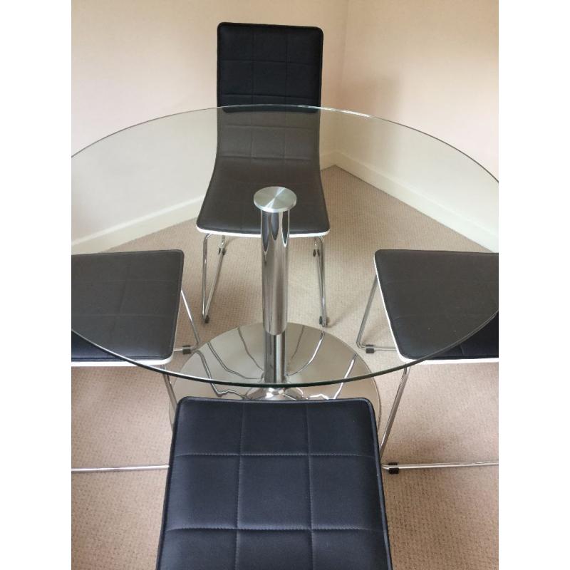 Immaculate Glass Top Table and 4 Faux Leather Chairs