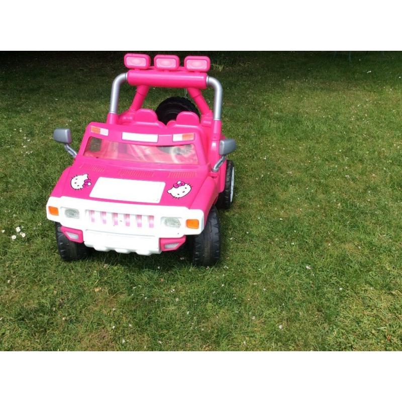 12v Injusa pink ride on jeep, good condition, new battery, charger and instructions