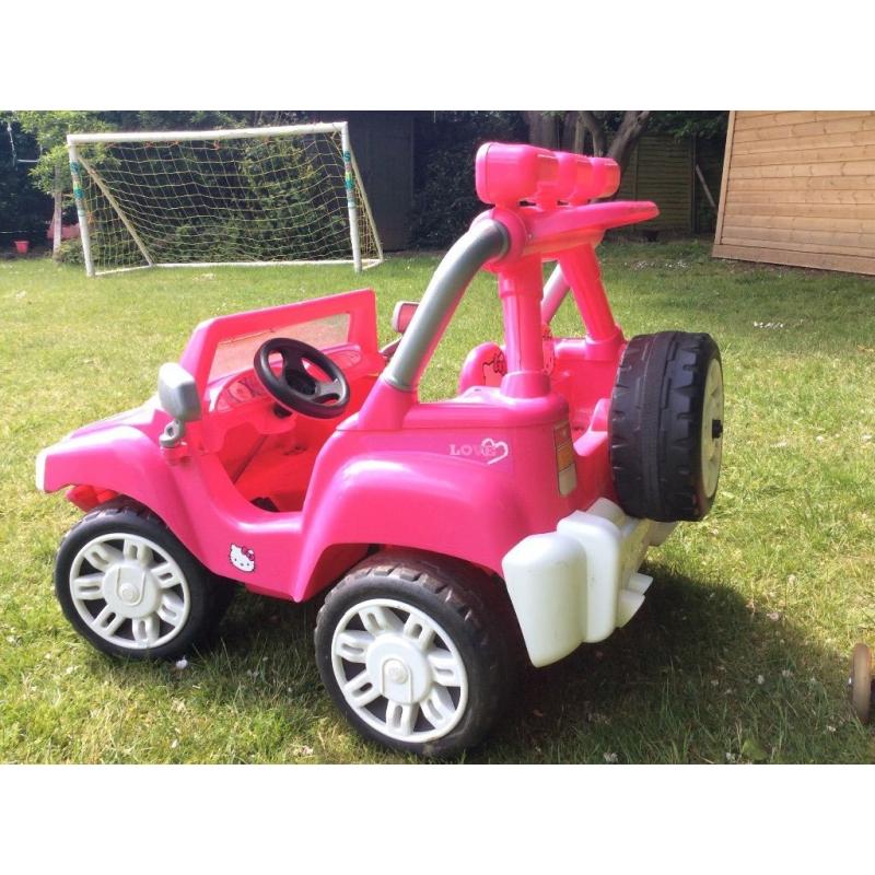 12v Injusa pink ride on jeep, good condition, new battery, charger and instructions