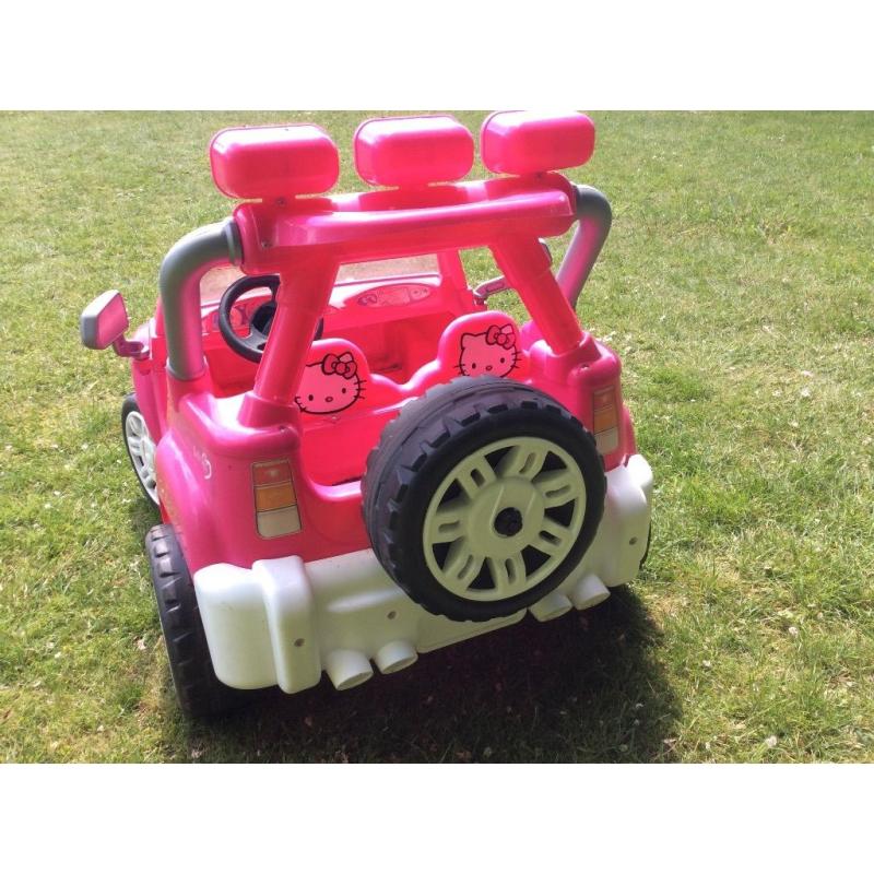 12v Injusa pink ride on jeep, good condition, new battery, charger and instructions