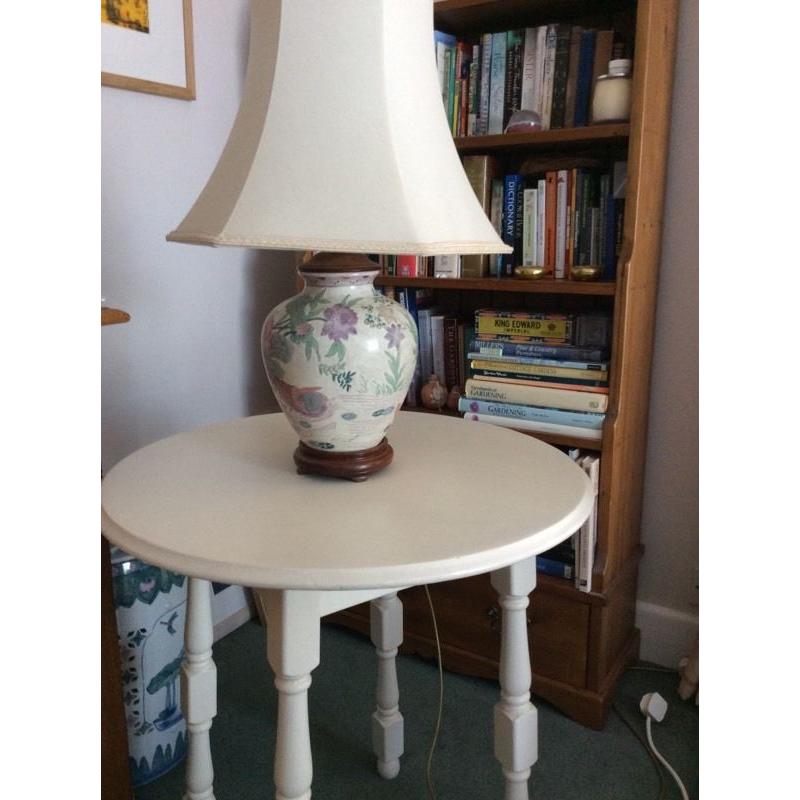 Cream circular occasional table, very smart