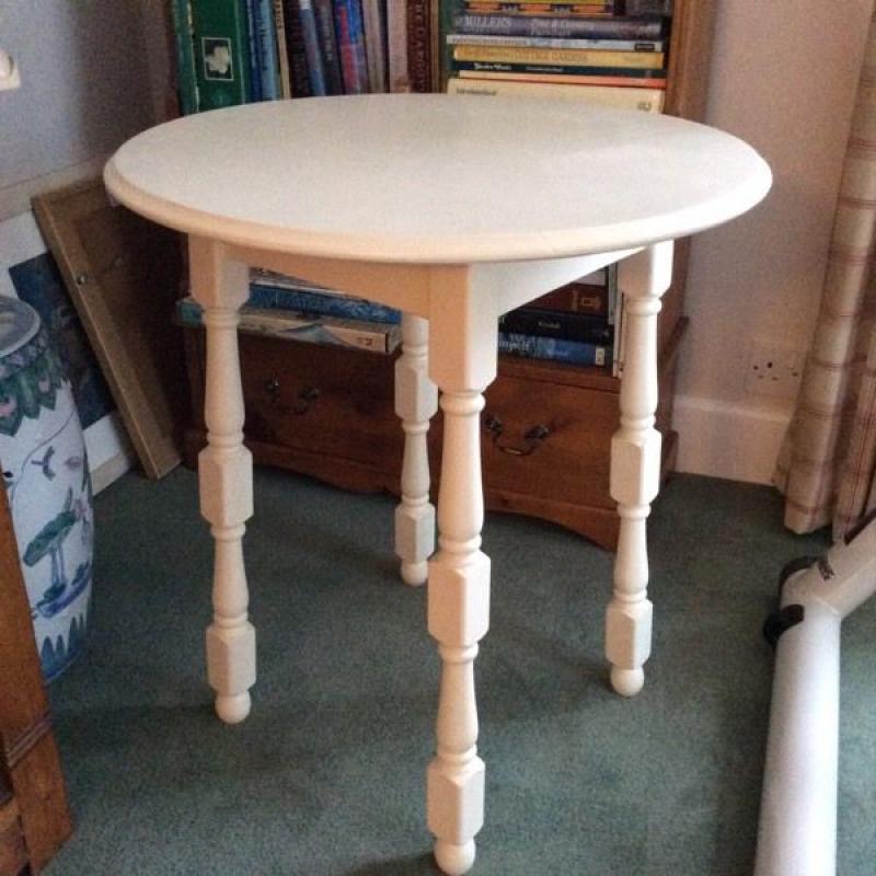 Cream circular occasional table, very smart