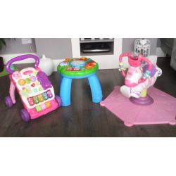 Bundle of toys zebra bouncer,leap frog activity table and vtech walker