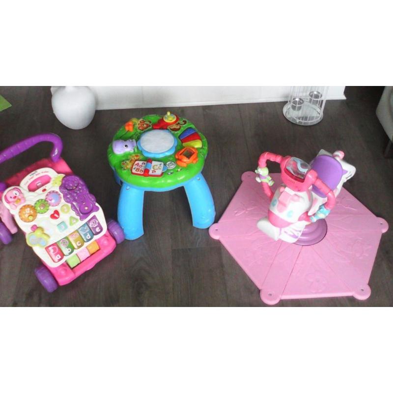 Bundle of toys zebra bouncer,leap frog activity table and vtech walker