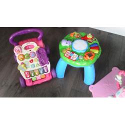 Bundle of toys zebra bouncer,leap frog activity table and vtech walker