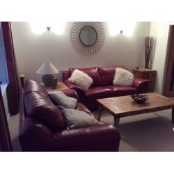 Dark red leather sofas,large 3 seater + 2 seater