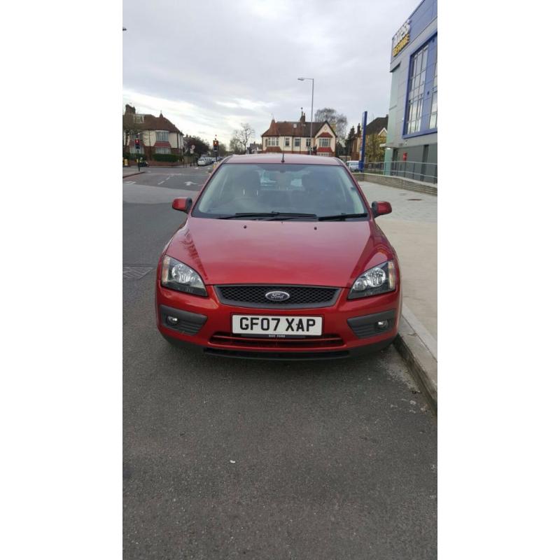 EXCELLENT RUNNER METALLIC RED 2007 MANUAL FORD FOCUS ZETEC 1.6L PETROL 70000 MILES 1 YR MOT 5 DOOR