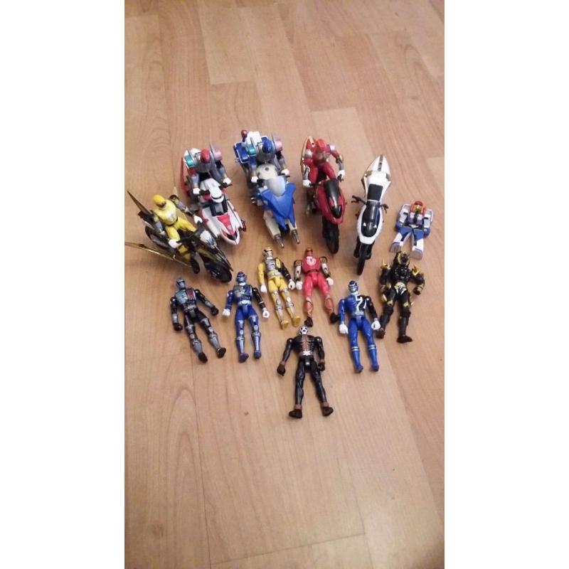 Selection of Power Rangers figures and bikes