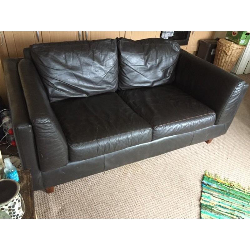 Black faux leather sofa