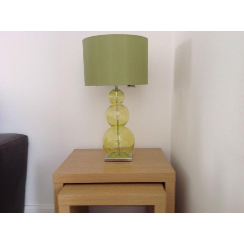 Two green next table lamps one floor lamp and matching ceiling pendant