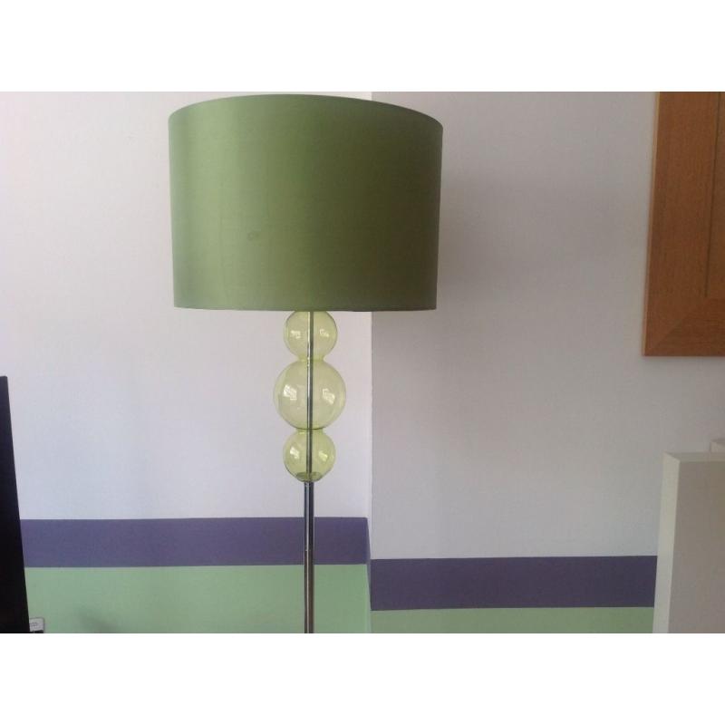 Two green next table lamps one floor lamp and matching ceiling pendant