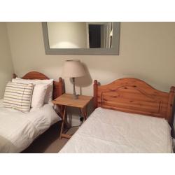 2 single pine beds including mattresses