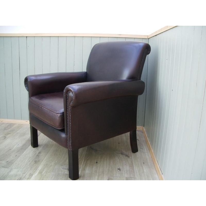 Brown leather Chesterfield Chair.