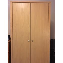 Oak coloured wardrobe, good condition.