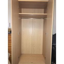 Oak coloured wardrobe, good condition.