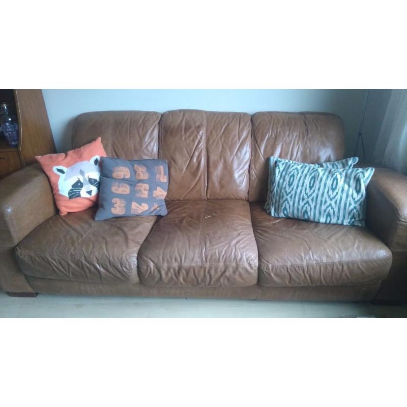 Leather sofa and footstool