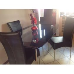 Dinning table with 4 black leather chairs