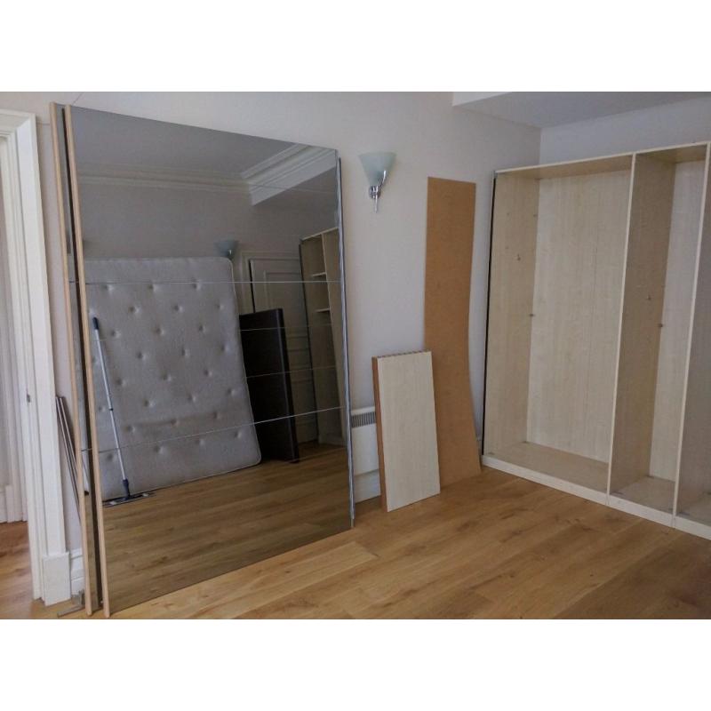 Large wardrobe with sliding miror doors