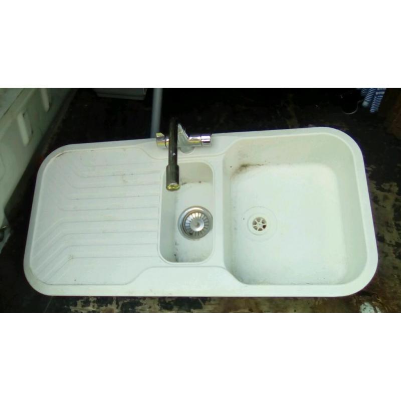 White plastic kitchen sink