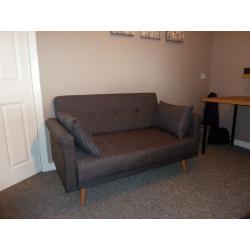 2 seater sofa. (Brand New)