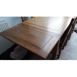 Solid Oak Dining Table with 6 chairs, only 2 years old. Great condition!