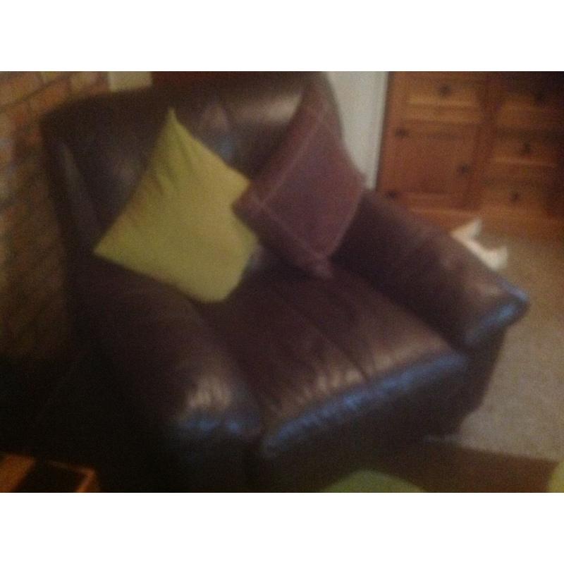 Leather 6 seater Sofa and Chair . Chocolate Brown .Sofa splits in 2 for moving .