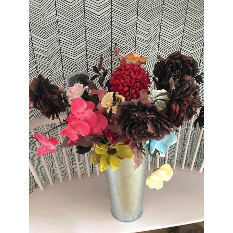 Large assortment of fake pretty flowers