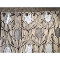 Lined eyelit patterned curtains