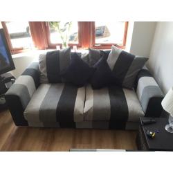 Large Grey/ Silver 3 and 4 seater sofas. Perfect condition only 12 months old.