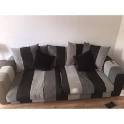 Large Grey/ Silver 3 and 4 seater sofas. Perfect condition only 12 months old.