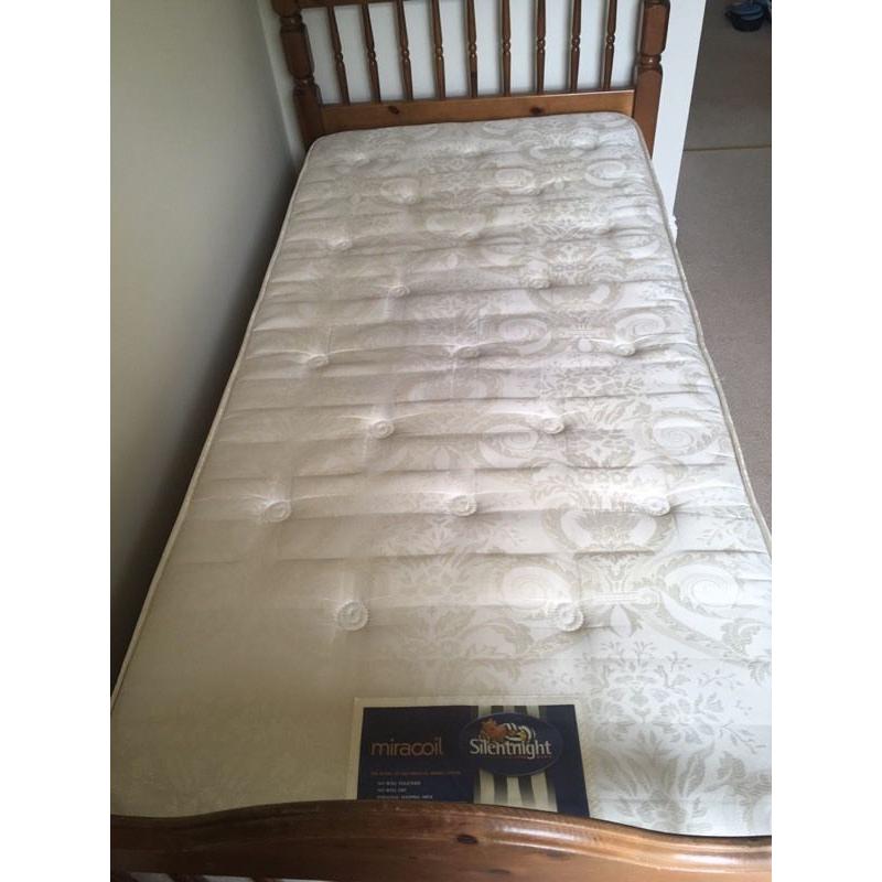 Solid wood pines single bed with silent night miracoil mattress.