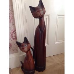 Wooden cats. Two wooden cats for sale cheeky smile