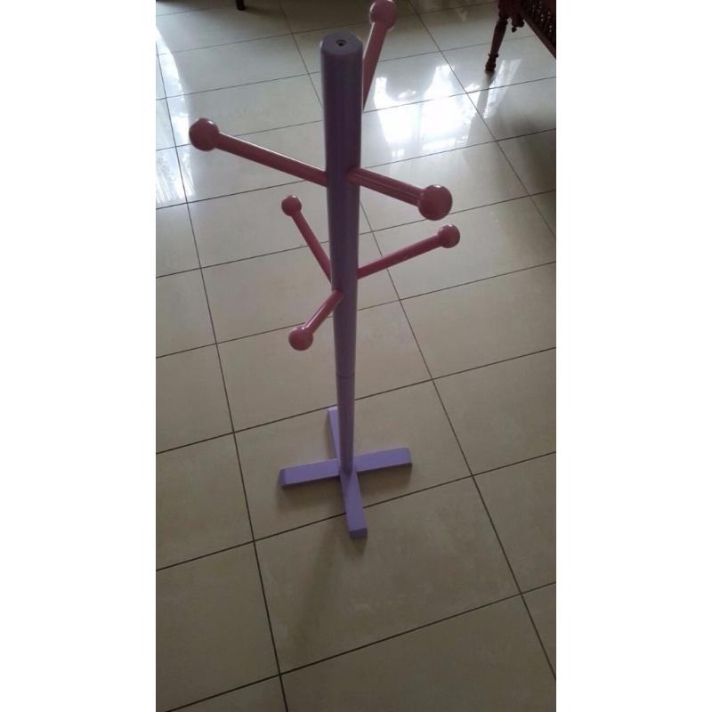 Girl's clothes hanger stand