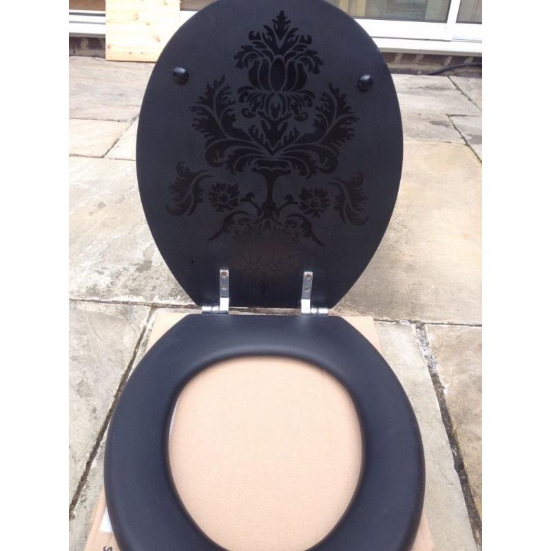 Black patterned wooden toilet seat