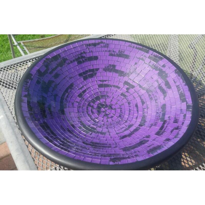 Large purple mosaic bowl.